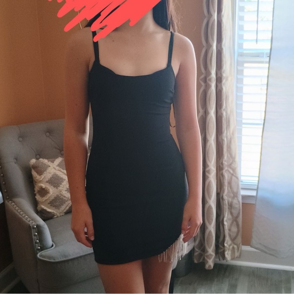 Tight Black Homecoming Dress with Silver Sparkly Strands on the Left Side